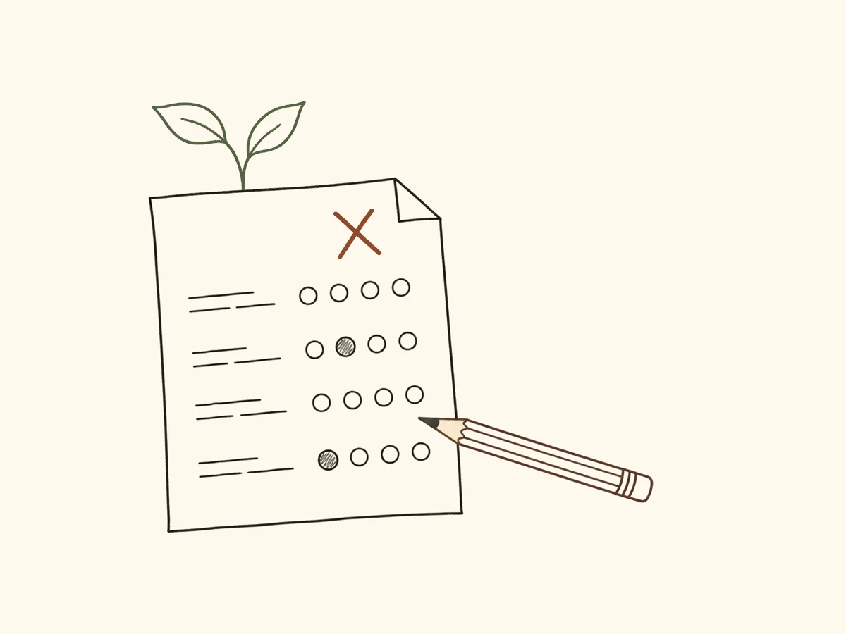 An aptitude-test sheet with answer bubbles, a pencil, a small cross and a growing sprout