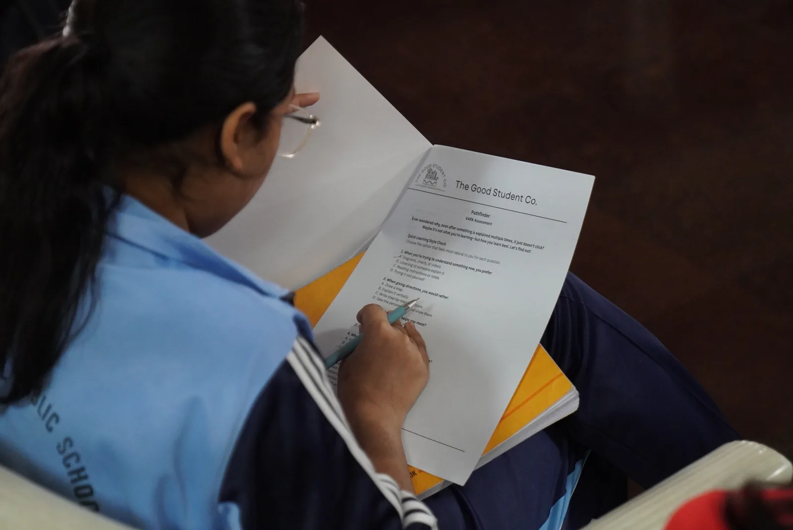 A worksheet resting on a desk as a student works through it